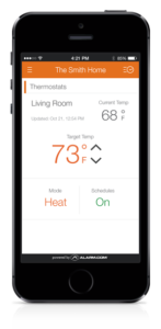 iPhone showing thermostat control from Alarm.com app