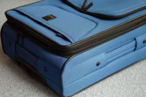 picture of a blue piece of luggage