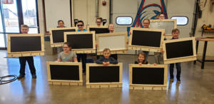 picture of students with finished farmhouse coat racks
