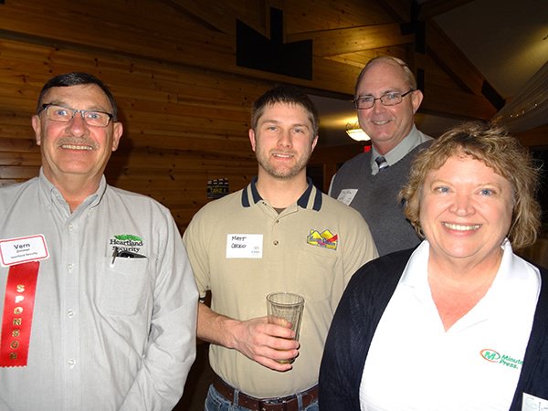 Regional Sales Manager Vern Zimmer, Matt Cecko of Home Check Plus, Tim Jensen, and Gloria Vande Brake of Minuteman Press" title="Regional Sales Manager Vern Zimmer, Matt Cecko of Home Check Plus, Tim Jensen, and Gloria Vande Brake of Minuteman Press