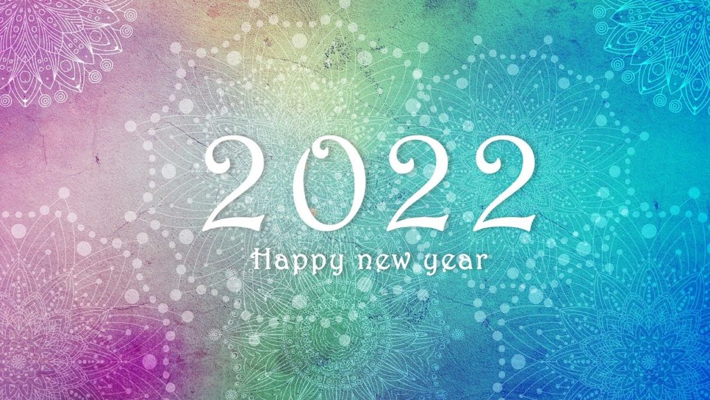 digital image with rainbow colored background with 2022 and Happy new year in white text