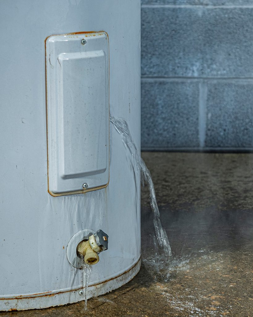 A water heater leaks water, causing home damage
